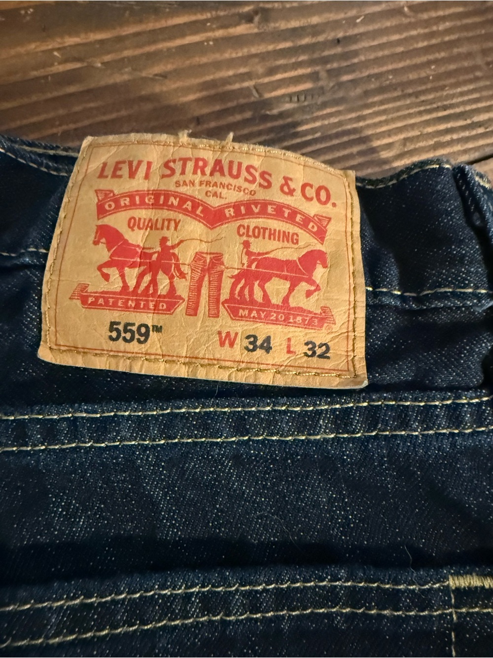 Levi's Men’s Relaxed Jeans in Dark Blue with Tan Patch